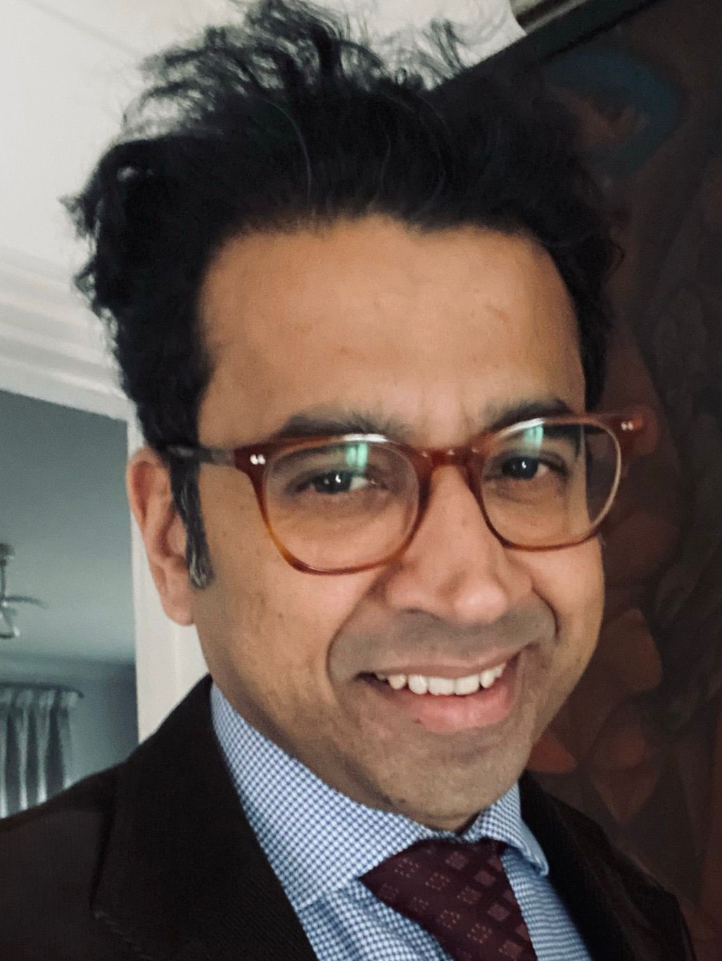 A photograph of Dr Muzaffar Husain