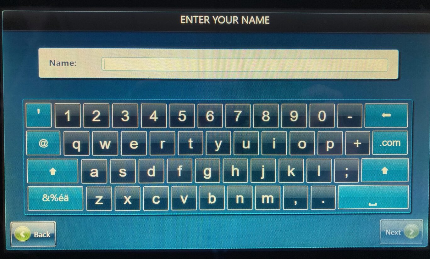 Screen with enter your name written at the top, with box and on-screen keypad for typing