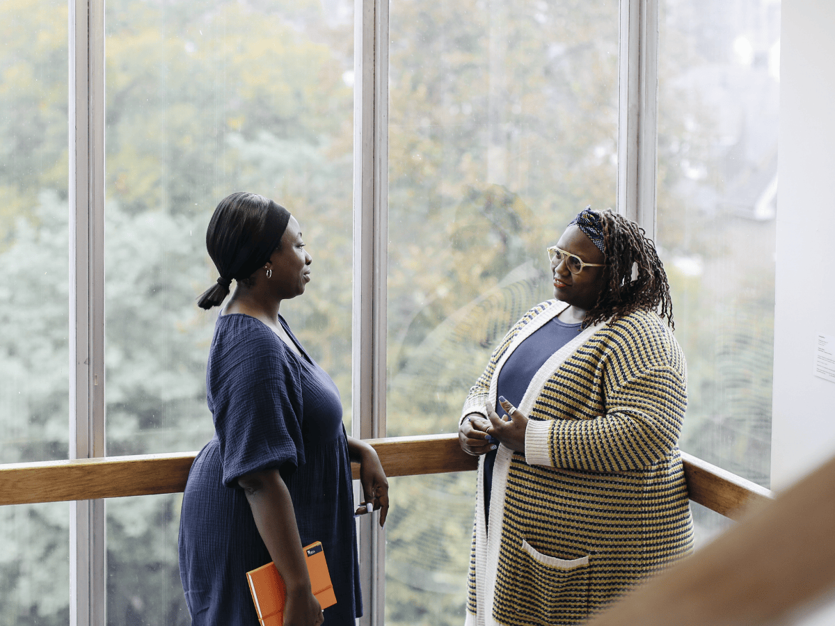 Student and tutor in stairway of Tavistock Centre