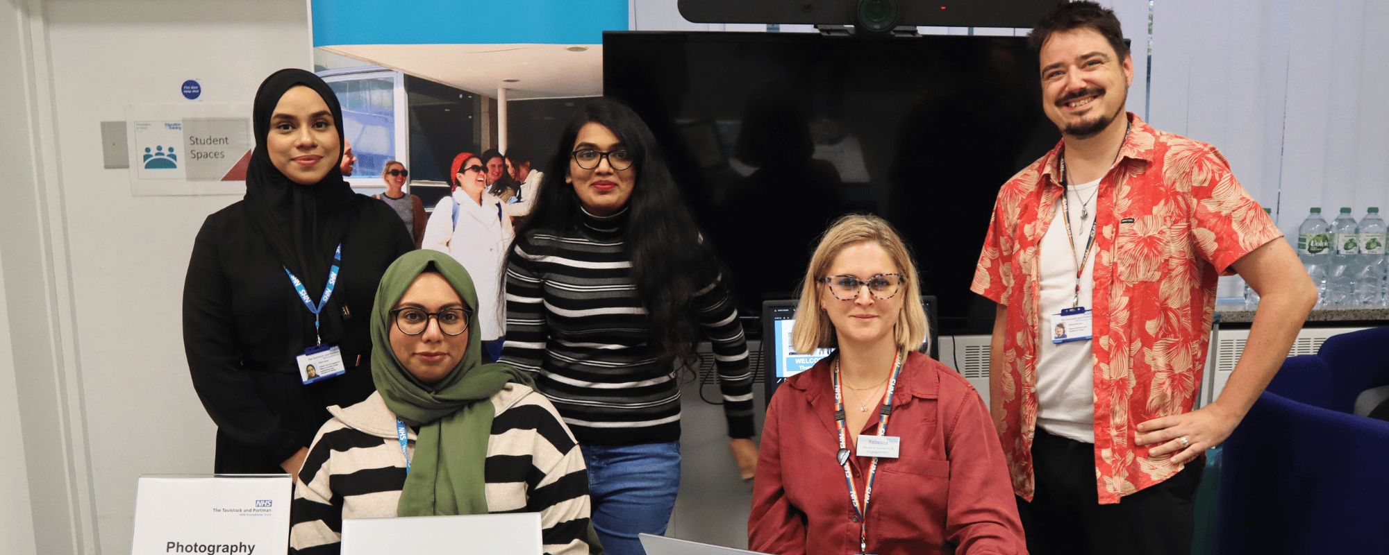 Five members of staff on the Welcome Desk during Welcome Week